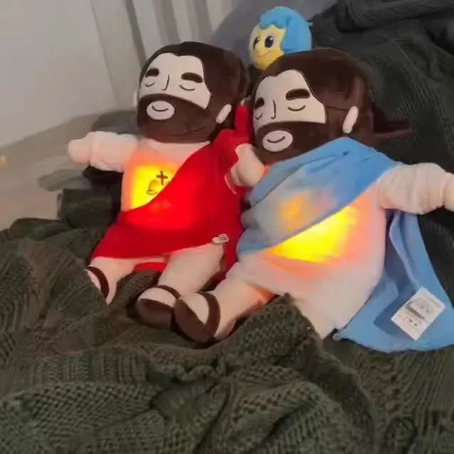 Pelúcia Jesus Calmante 40cm – Luz, Música e Respiração Suave